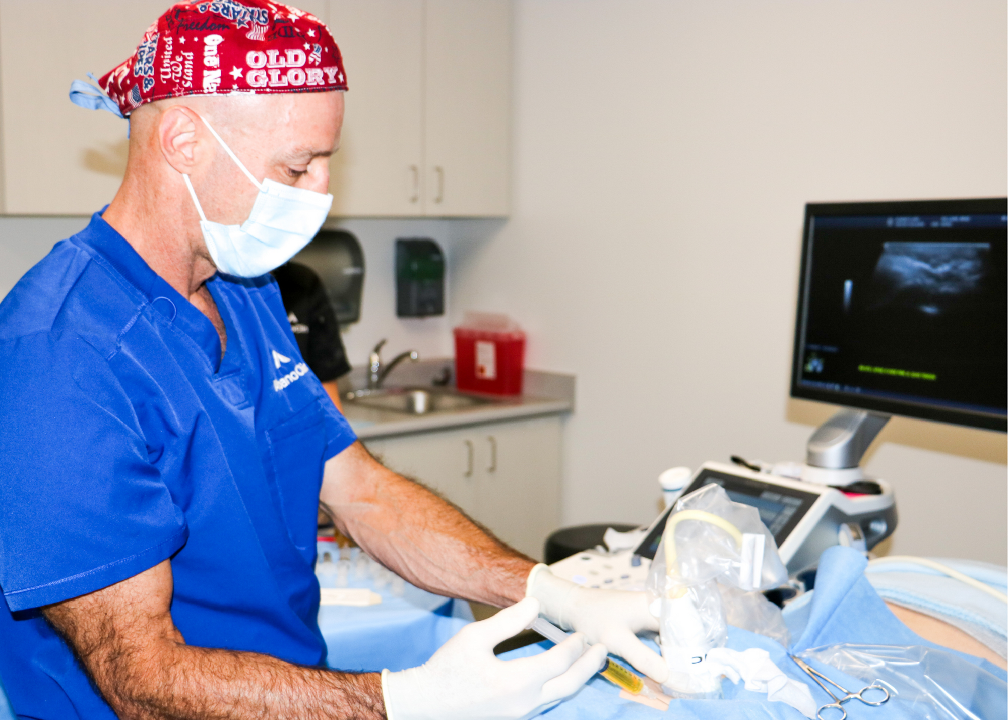 Dr. Albano doing stem cell therapy injections and PRP